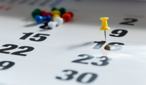Calendar close-up with highlighted dates representing apprenticeship duration, timelines and training milestones.
